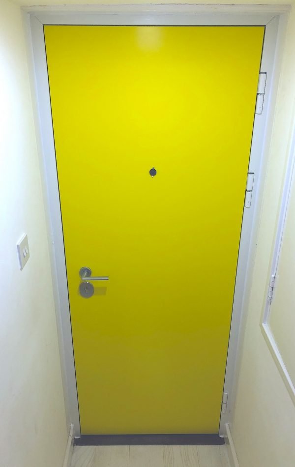 RC3 front security door in bright yellow colour.