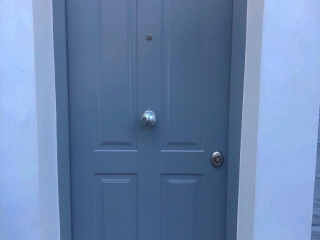 Four panel design security door in Fulham.