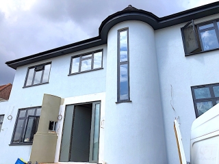 Modern design, big security door with two side panels and security glass in Harrow.