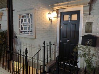 Security level 4 front door with optional bullet resistant glass and spy hole upgrade installed in Kensington.
