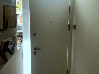 Security front door with arch panel installed in Fulham.
