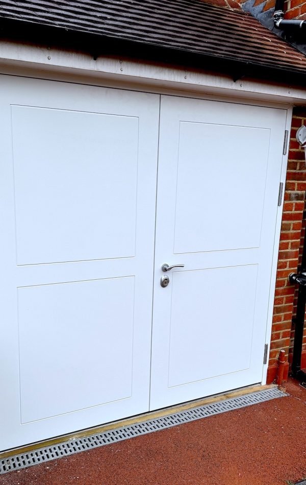 Double leaf security door installed in a sound studio.