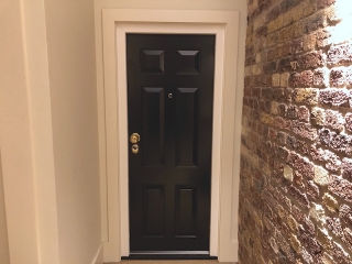 Like to like design black safety doors installed in Wapping