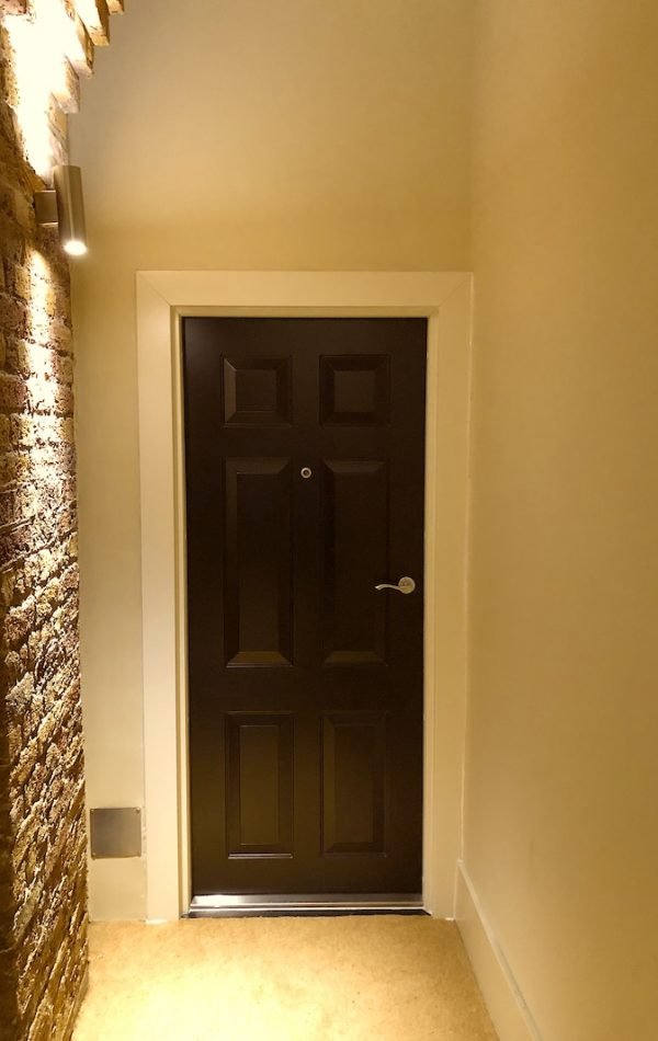Front security door with no keyhole from outside for additional security.