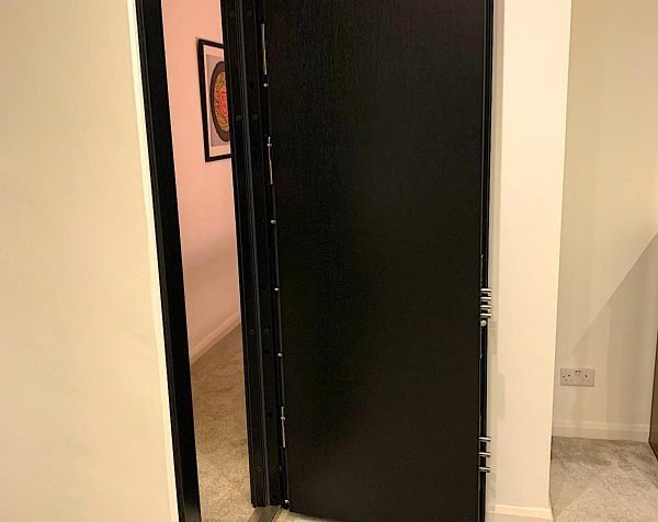 Panic-Room-Door.jpg Panic room door with semi auto for faster locking installed in Barking.