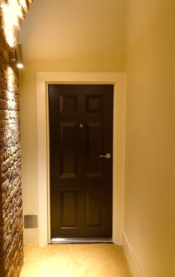 Front security door with no keyhole from outside for additional security.