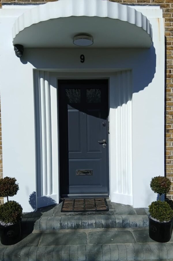 Anthracite grey security door fitted in like for like design.