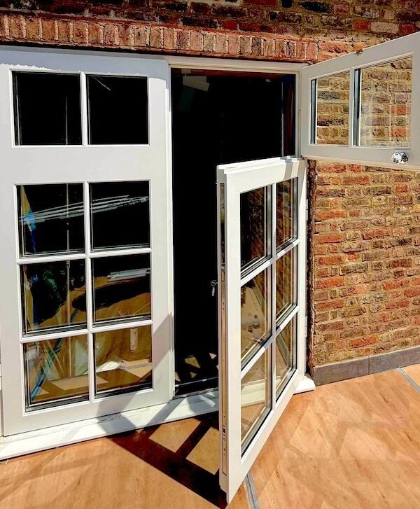 Bespoke security french doors installed instead of custom security windows in Kensington.