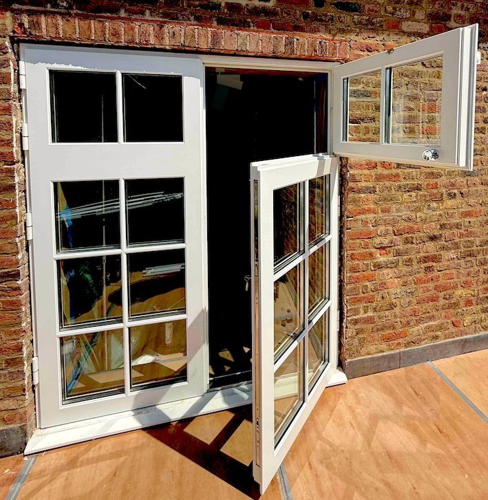 Bespoke security french doors installed instead of custom security windows in Kensington.