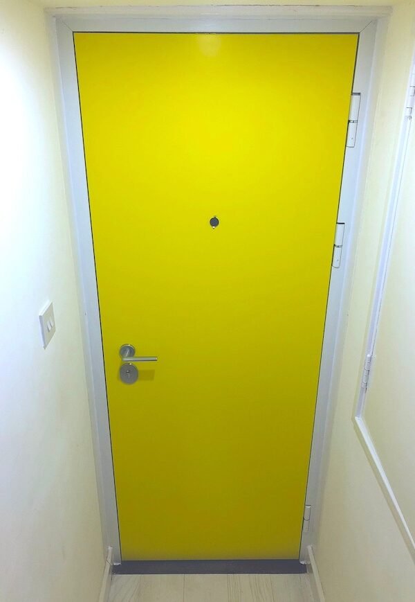 RC3 front security door in bright yellow colour.