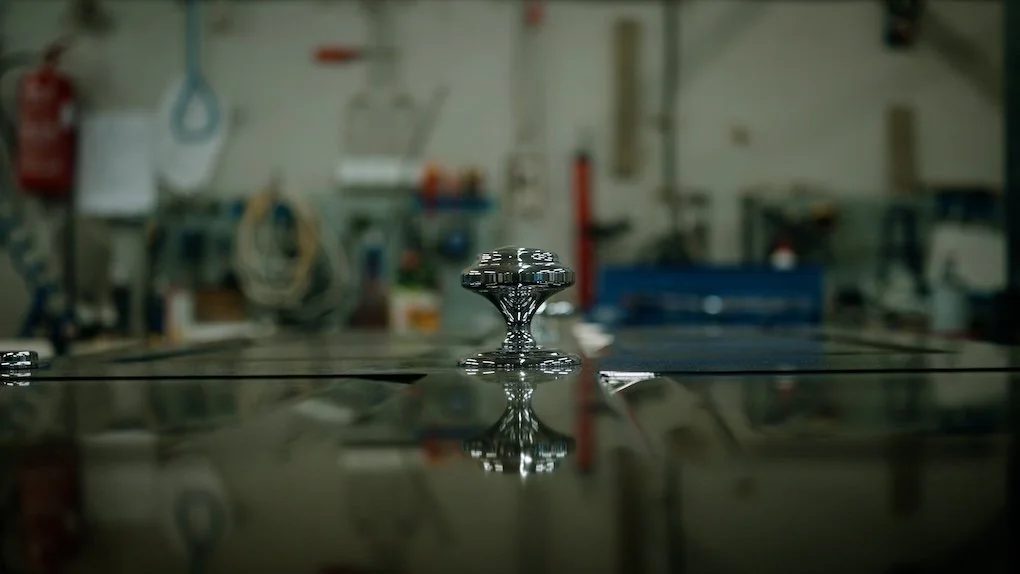 Polished door hardware and handcrafted detailing